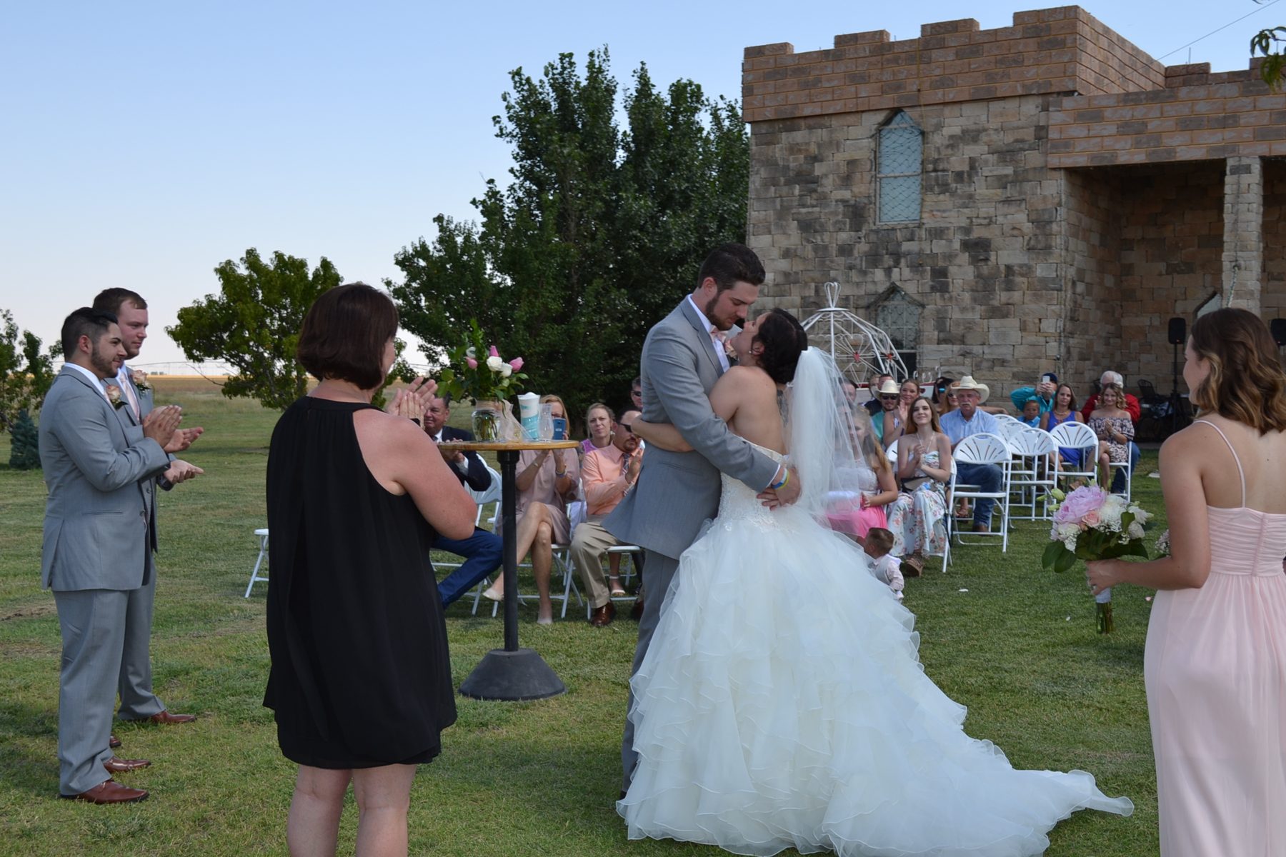 Outdoor wedding ceremony at the castle walls