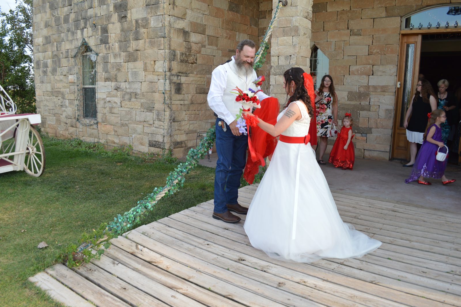 Bride and groom at the castle doors